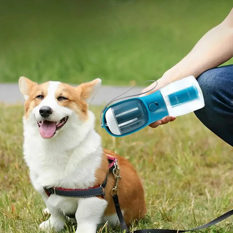 3-in-1 Portable Pet Water Bottle – 300ml Water + Food Container + Waste Bag Dispenser